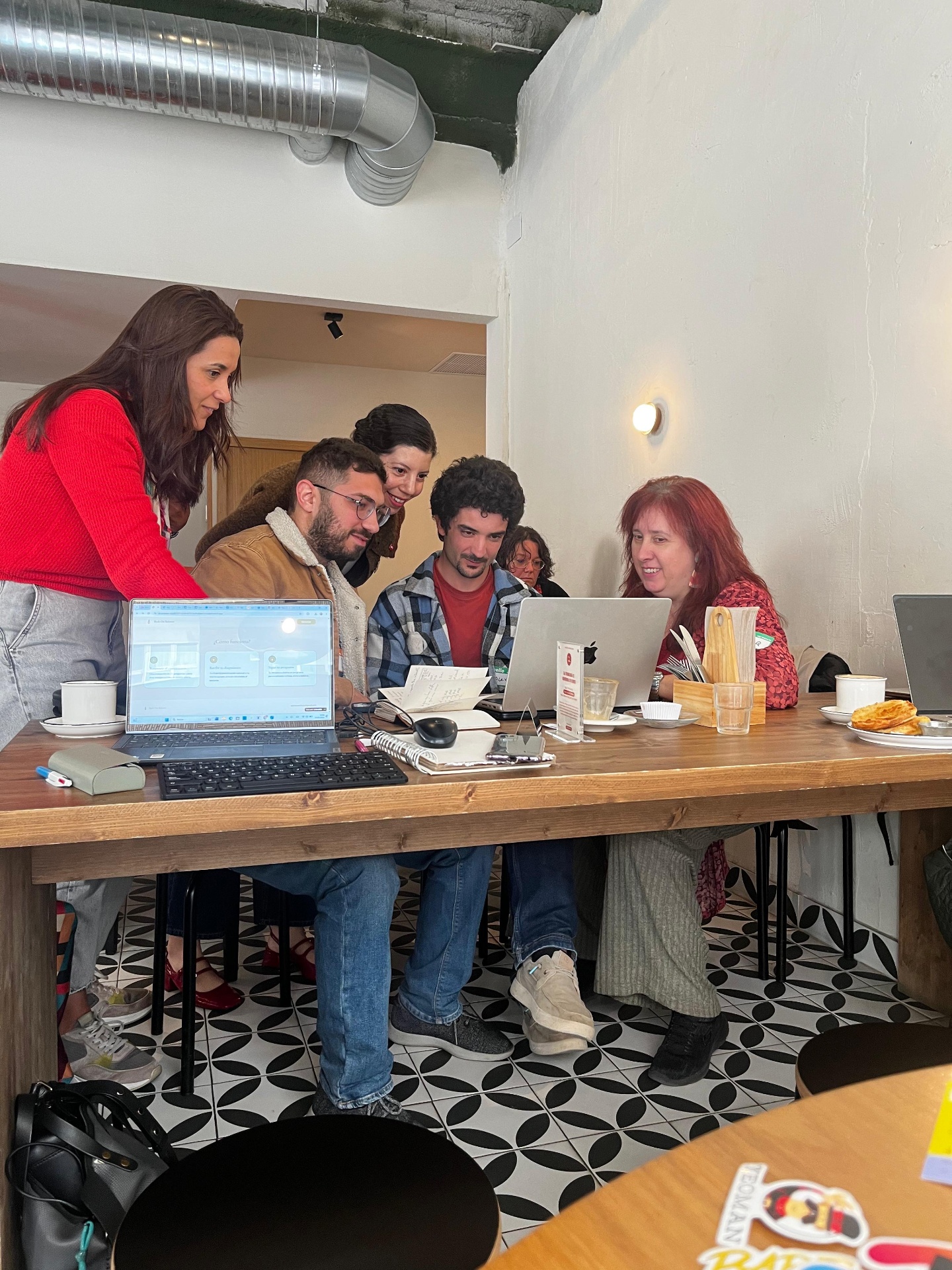 Attendees working at Coworking Café 01