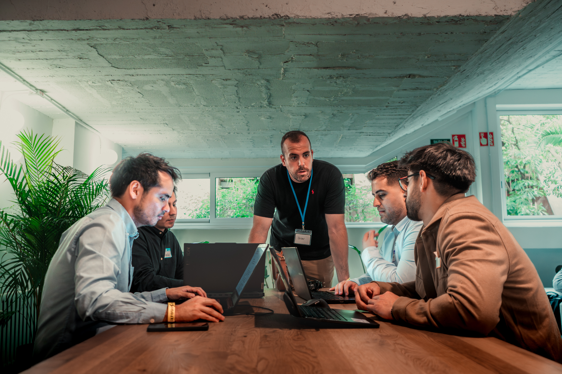 Mentor guiding a group of founders