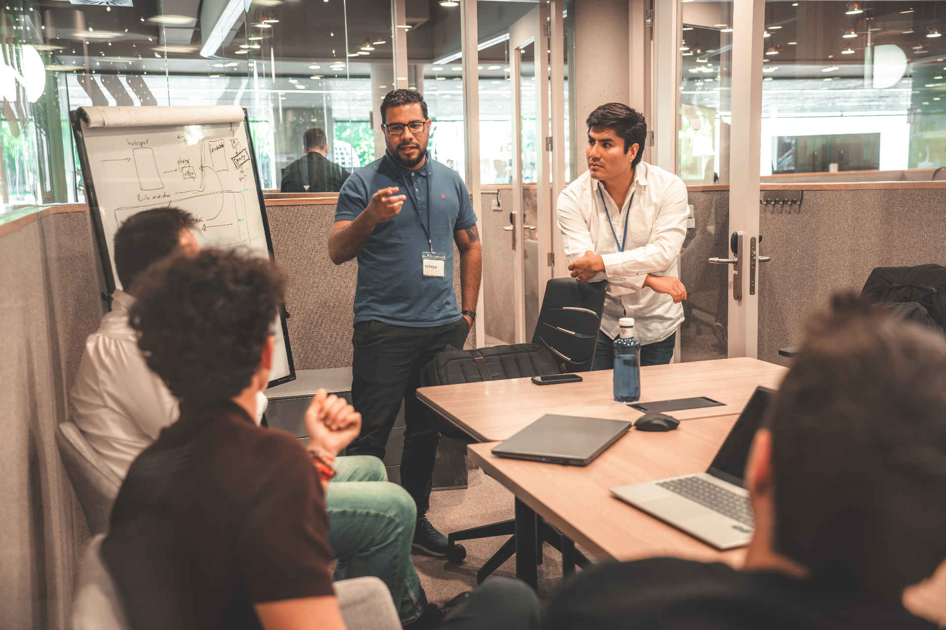 Mentoring session by the whiteboard
